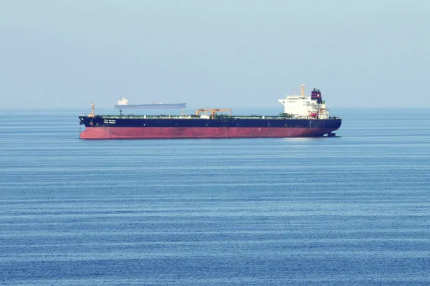 FILE PHOTO: Oil tankers pass through the Strait of Hormuz, December 21, 2018. REUTERS/Hamad I Mohammed/File Photo