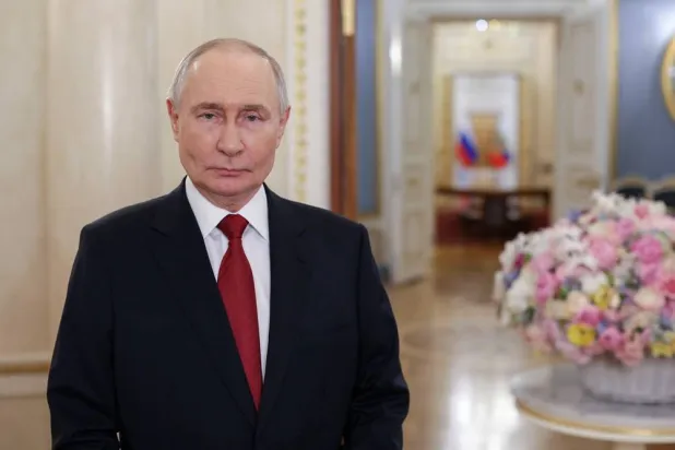  Russian President Vladimir Putin delivers a video address to congratulate Russia's women on International Women's Day at the Kremlin in Moscow, Sunday, March 8, 2026. (Gavriil Grigorov/Sputnik, Kremlin Pool Photo via AP) 