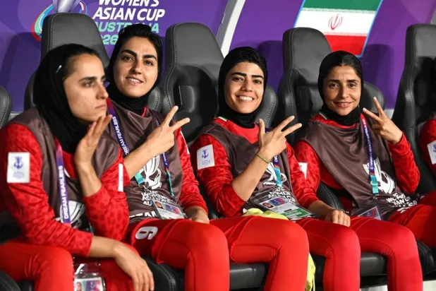 Iran team captain Zahra Ghanbari (2-L), Mona Hamoudi (C) and Atefeh Ramazanzadeh (R) react from the bench during the AFC Women’s Asian Cup Group A match between Iran and Philippines at Gold Coast Stadium on the Gold Coast, Australia, 08 March 2026. (EPA)