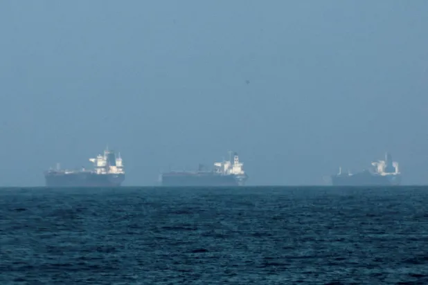 FILE PHOTO: Tankers are seen off the coast of Fujairah, as Iran vows to fire on ships transiting the Strait of Hormuz, amid the US-Israel conflict with Iran, in Fujairah, United Arab Emirates, March 3, 2026. REUTERS/Amr Alfiky/File Photo
