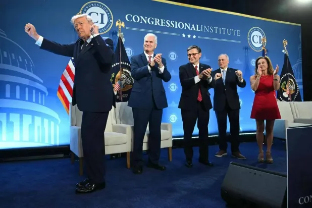 US President Donald Trump dances during a private celebration with the Republican majority in the House of Representatives in Florida on Monday (AFP)