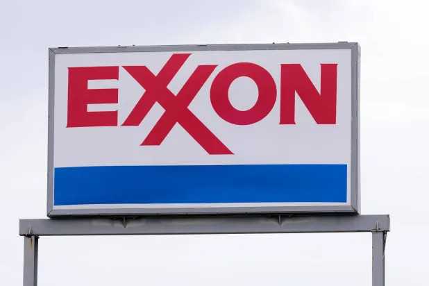 An Exxon gas station sign in Dallas, Friday, March 6, 2026. (AP Photo/Tony Gutierrez)
