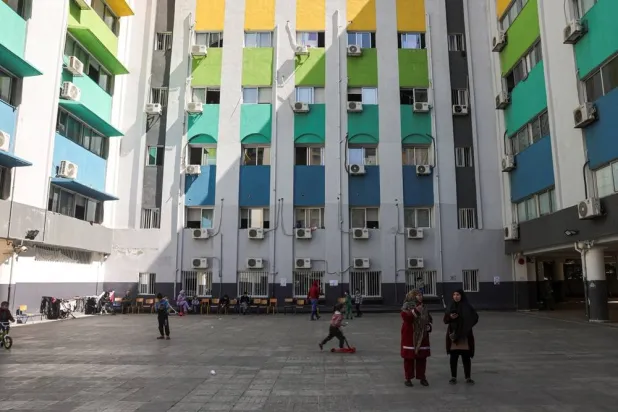Civilians gather in the courtyard of a school where they take shelter, following an escalation between Hezbollah and Israel, amid the US-Israeli conflict with Iran, in Beirut, Lebanon, March 11, 2026. (Reuters)