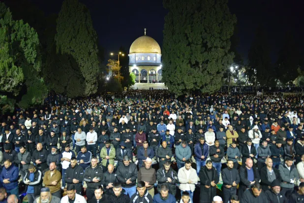 20 February 2026, Palestinian Territories, Jerusalem: Palestinians perform the Taraweeh prayers in the courtyards of the Al-Aqsa Mosque on the third day of Ramadan. Photo: Department Of Islamic Awqaf In J/APA Images via ZUMA Press Wire/dpa
