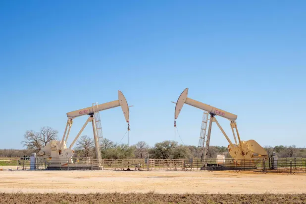 Teksas eyaletindeki bir petrol sahasında bulunan petrol pompaları (AFP)