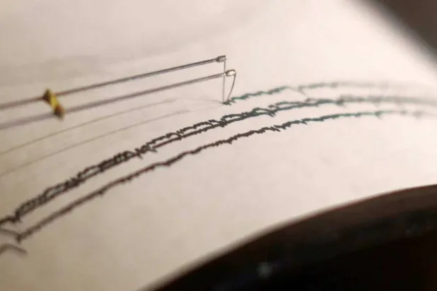  A working seismograph is shown in a display about earthquakes. (Reuters)