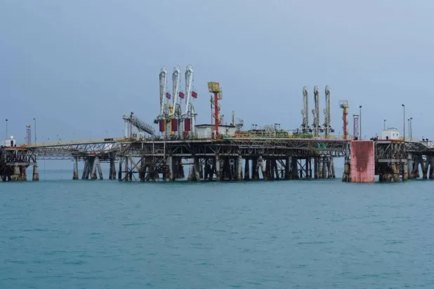 Floating oil export loading platforms at the Basra Oil Port, Iraq, March 12, 2026. REUTERS/Mohammed Aty