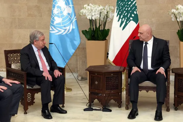  In this photo released by the Lebanese Presidency press office, Lebanese President Joseph Aoun, right, meets with United National Secretary-General Antonio Guterres, at the presidential place in Baabda, east of Beirut, Lebanon, Friday, March 13, 2026. (Lebanese Presidency press office via AP) 