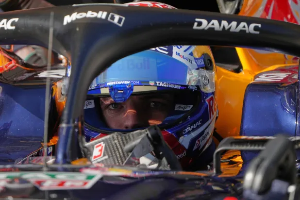 Red Bull driver Max Verstappen of the Netherlands waits inside his car during the qualifying session of the Chinese Formula One Grand Prix at the Shanghai International Circuit, in Shanghai, China, Saturday, March 14, 2026. (AP Photo/Andy Wong, Pool)