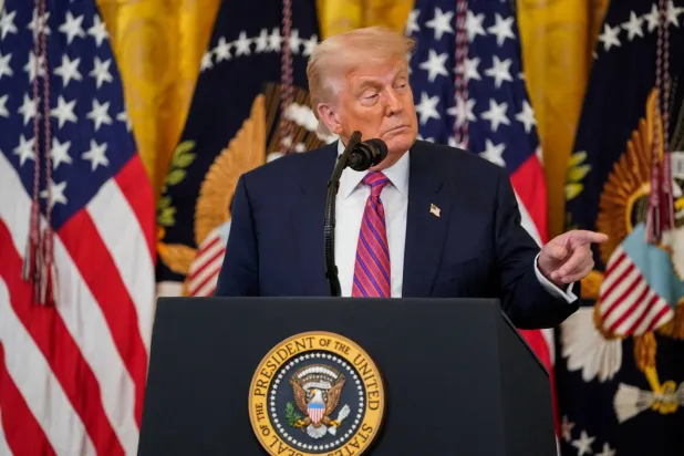 US President Donald Trump speaks before signing the "Genius Act", which will develop regulatory framework for stablecoin cryptocurrencies and expand oversight of the industry, at the White House in Washington, D.C., US, July 18, 2025. REUTERS/Nathan Howard/File Photo