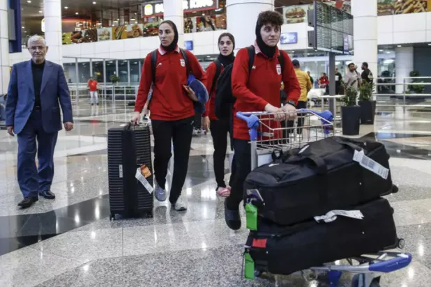 The members of Iran's women's football team who did not claim asylum in Australia arrived at the Kuala Lumpur International Airport on March 11, 2026 © ARIF KARTONO / AFP
