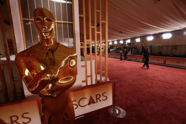  An Oscar statue stands on the red carpet the night prior to the 98th Academy Awards in Los Angeles, California, US, March 14, 2026. (Reuters)