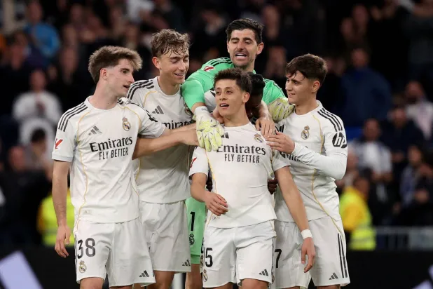 Football - LaLiga - Real Madrid v Elche - Santiago Bernabeu, Madrid, Spain - March 14, 2026 Real Madrid's Arda Guler celebrates scoring their fourth goal with Cesar Palacios, Dean Huijsen, Thibaut Courtois and Diego Aguado. (Reuters)