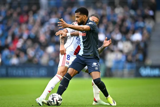 أولمبيك ليون اكتفى بالتعادل مع مضيّفه لوهافر (أ.ف.ب)