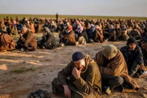 Tutuklu DEAŞ üyelerinden bir grup (Arşiv-WAA)