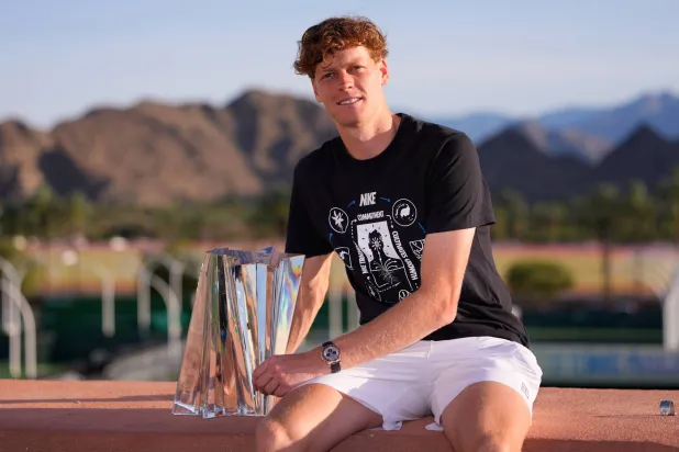 Jannik Sinner of Italy poses with his trophy after defeating Daniil Medvedev of Russia in the final at the BNP Paribas Open tennis tournament Sunday, March 15, 2026, in Indian Wells, Calif. (AP Photo/Mark J. Terrill)