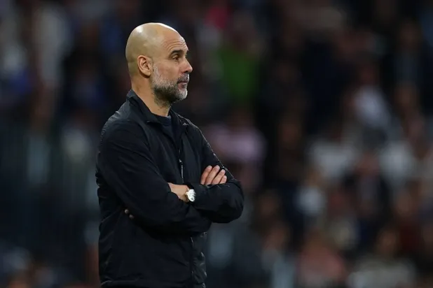  Football - UEFA Champions League - Round of 16 - First Leg - Real Madrid v Manchester City - Santiago Bernabeu, Madrid, Spain - March 11, 2026 Manchester City manager Pep Guardiola looks on. (Action Images via Reuters)