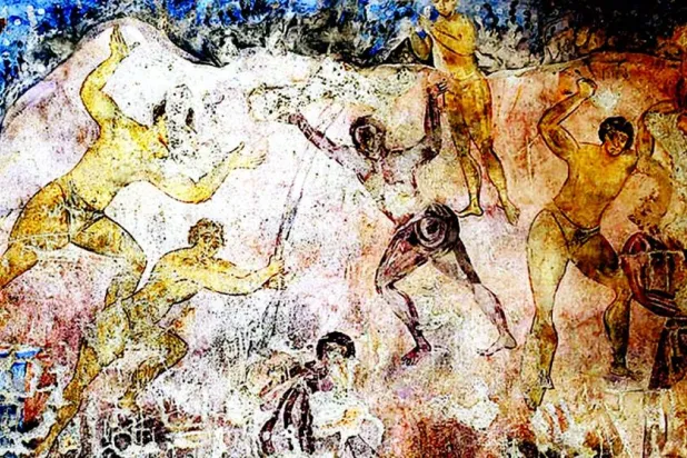 مصارعة جماعية في لوحة من جداريات قصير عمرة الأموي في بيداء الأردن