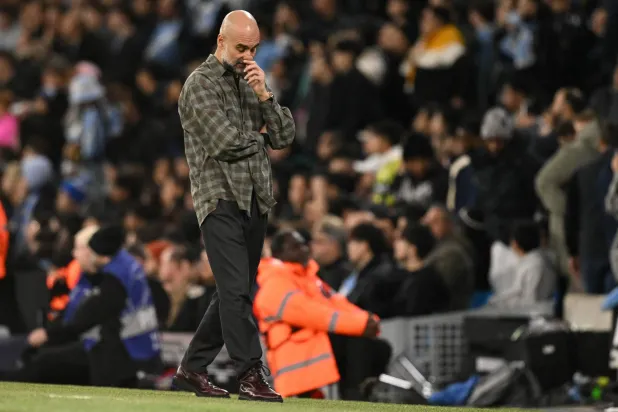 Manchester City's Spanish manager Pep Guardiola reacts on the touchline during the UEFA Champions League, round of 16 second leg football match between Manchester City and Real Madrid at the Etihad Stadium in Manchester, north west England, on March 17, 2026. (Photo by Oli SCARFF / AFP)