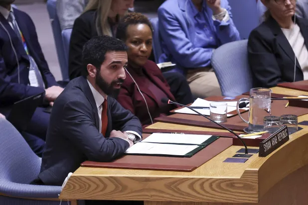 Permanent Representative of Syria to the United Nations, Ibrahim Olabi (L), speaks during a Security Council meeting discussing Syria and the Middle East at United Nations headquarters in New York, New York, USA, 18 March 2026. (EPA)