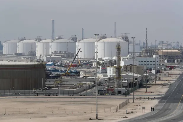  This picture shows the Ras Laffan Industrial City, Qatar's principal site for production of liquefied natural gas and gas-to-liquid, administrated by Qatar Petroleum, some 80 kilometers (50 miles) north of the capital Doha, on February 6, 2017.(Photo by KARIM JAAFAR / AFP)