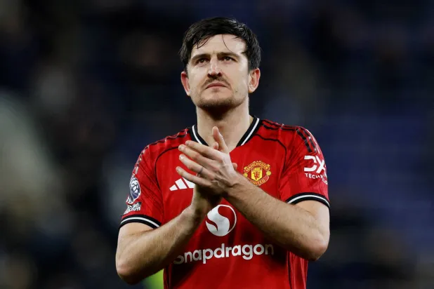 FILE PHOTO: Soccer Football - Premier League - Everton v Manchester United - Hill Dickinson Stadium, Liverpool, Britain - February 23, 2026 Manchester United's Harry Maguire applauds fans after the match Action Images via Reuters/Jason Cairnduff 