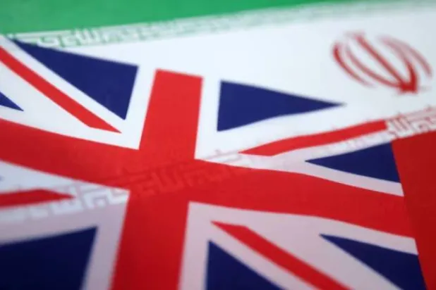 UK and Iran flags are seen in this illustration taken June 18, 2025. REUTERS/Dado  