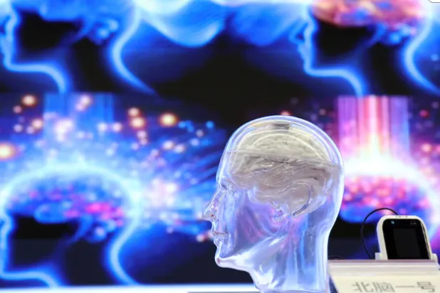 Beinao-1, a semi-invasive brain-machine interface system also known as the NeuCyber Matrix BMI system, is displayed during a media briefing as part of an organised media tour to the Chinese Institute for Brain Research in Beijing, China March 19, 2026. REUTERS/Florence Lo 