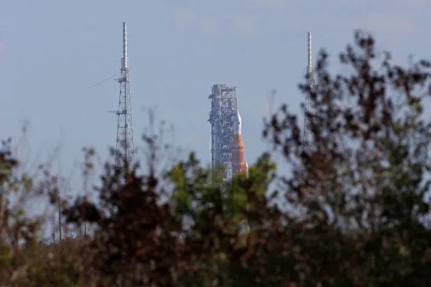 NASA's Artemis II Space Launch System (SLS) rocket and Orion spacecraft are seen at Launch Pad 39B at the Kennedy Space Center in Cape Canaveral, Florida on March 20, 2026. (Photo by Gregg Newton / AFP)