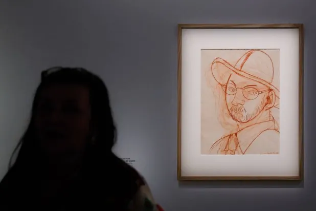 Artwork entitled "Autoportrait au chapeau de paille" by French artist Henri Matisse on display during the exhibition "Matisse 1941-1954" at the Grand Palais in Paris, France, 19 March 2026. (EPA)