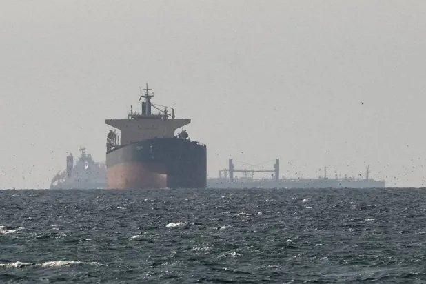 Tankers sail in the Gulf, near the Strait of Hormuz, as seen from northern Ras al-Khaimah, near the border with Oman’s Musandam governance, March 11, 2026. REUTERS/Stringer/File Photo