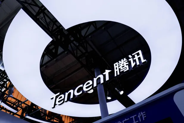 FILE PHOTO: Tencent's logo is displayed at its booth at the China International Fair for Trade in Services (CIFTIS) in Beijing, China, September 11, 2025. REUTERS/Maxim Shemetov/File Photo