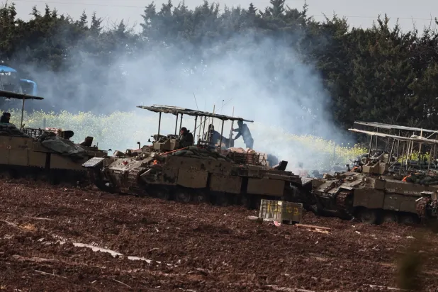 Israeli tanks are deployed along the northern Israeli border with Lebanon, 21 March 2026. EPA/ATEF SAFADI