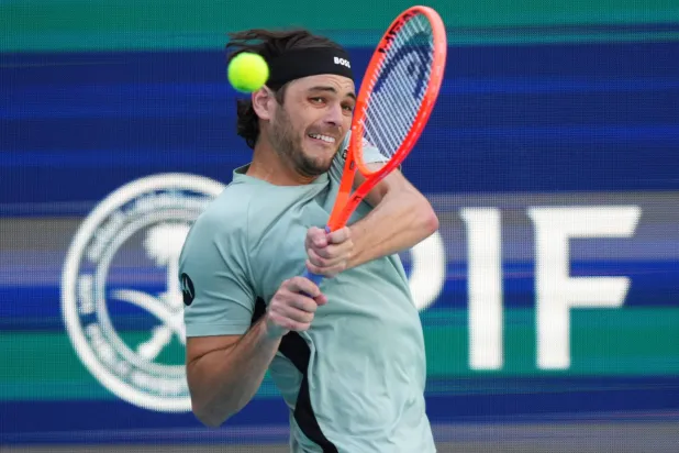 الأميركي تايلور فريتز يتألق في ميامي (أ.ف.ب)