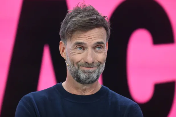 23 March 2026, Bavaria, Ismaning: German football coach Jurgen Klopp  on stage at the Telekom press conference to present the concept for the World Cup. Photo: Felix Hörhager/dpa