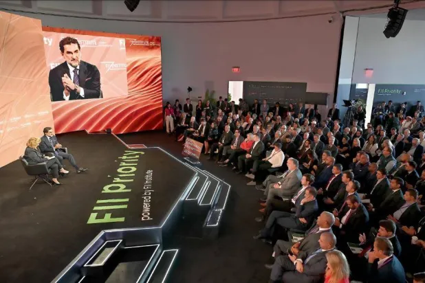 PIF Governor Yasir Al-Rumayyan during a previous FII summit in Miami. (Asharq Al-Awsat)