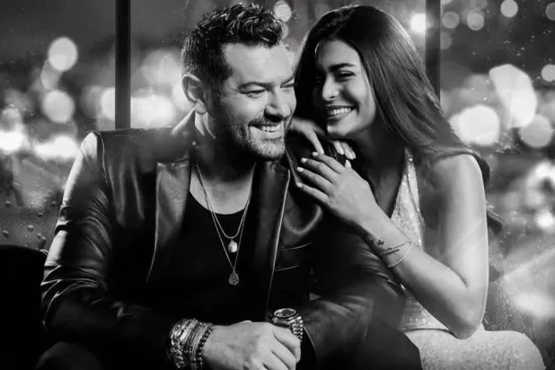 عمرو يوسف وأسماء جلال في مشهد من الفيلم (الشركة المنتجة)