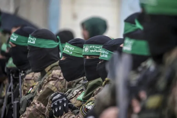 Gunmen from Hamas’ Qassam Brigades in Nuseirat refugee camp, central Gaza, February 2025 (EPA)