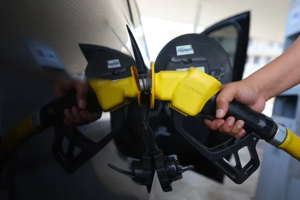 A man fills his car with petrol at the petrol station in Port Dickson, Negri Sembilan, Malaysia, 25 March 2026. EPA/FAZRY ISMAIL