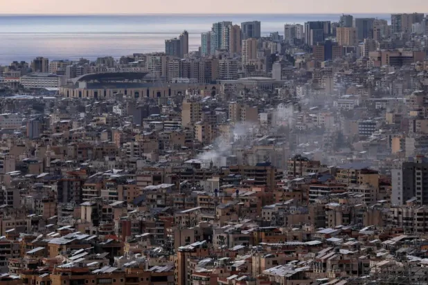 Smoke rises after an Iranian missile is intercepted over the Sahel Alma area in Mount Lebanon. (Reuters)