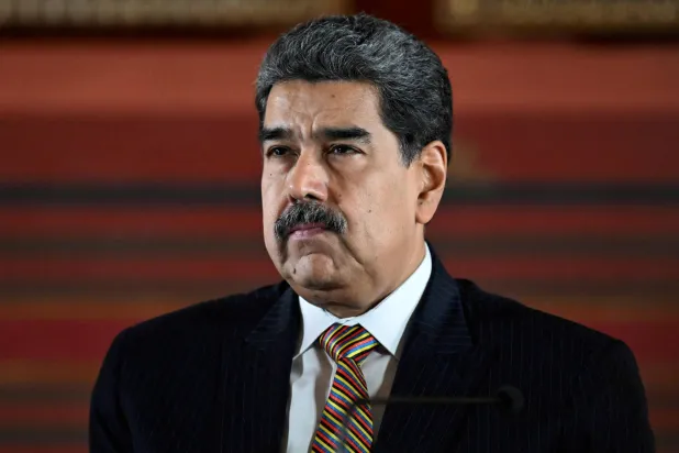 (FILES) Venezuela's President Nicolas Maduro looks on during a meeting at the National Assembly in Caracas on August 22, 2025. (Photo by Juan BARRETO / AFP)