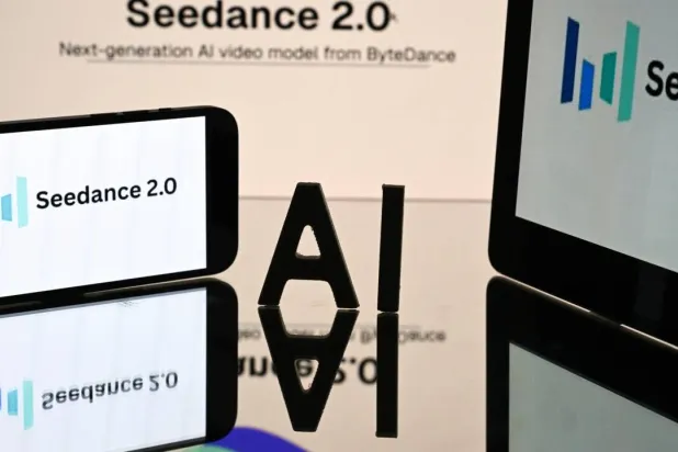 A smartphone displays the logo of Seedance 2.0, the image-to-video and text-to-video AI model. Lionel BONAVENTURE / AFP/File
