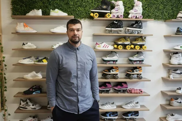  Mohamed Boukhatem, co-founder and director of SneakCoeurZ, a nonprofit organization giving used footwear a second life, poses in Champs-sur-Marne, east of Paris, Wednesday, March 25, 2026. (AP) 