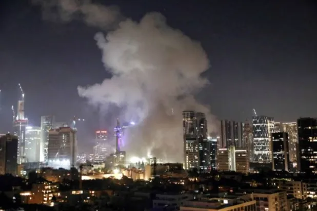 Smoke rises following a missile attack from Iran on Tel Aviv (Reuters)