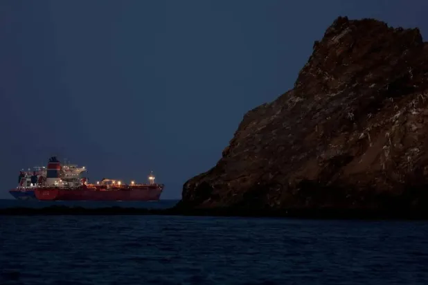 An oil tanker crossing the Strait of Hormuz (Reuters)