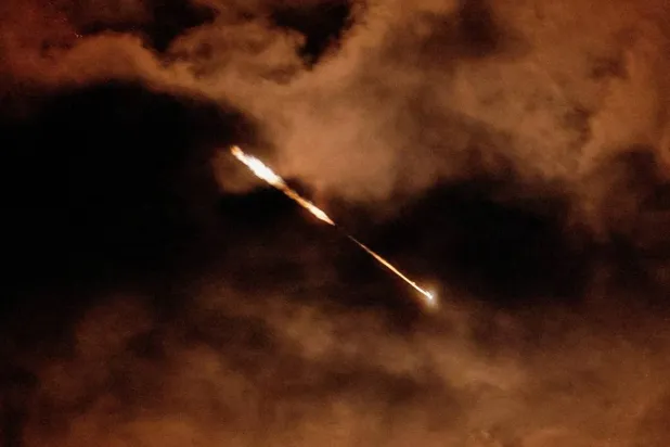 Streaks of light illuminate the sky during an interception attempt, amid the US-Israeli conflict with Iran, as seen from Ashkelon, Israel, March 28, 2026. (Reuters)