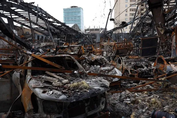 Wreckage of vehicles at an auto service center in Tehran, Iran, 28 March 2026. (EPA) 
