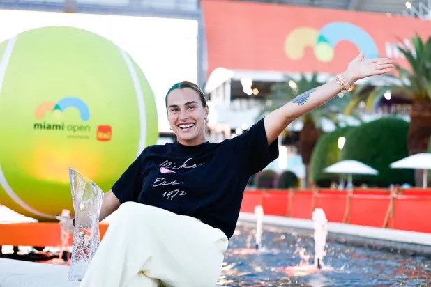 Aryna Sabalenka poses with the Butch Buchholz trophy after defeating Coco Gauff of the United States during the Women's Singles Final on Day 12 of the Miami Open Presented by Itau at Hard Rock Stadium on March 28, 2026, in Miami Gardens, Florida. (Getty Images/AFP) 