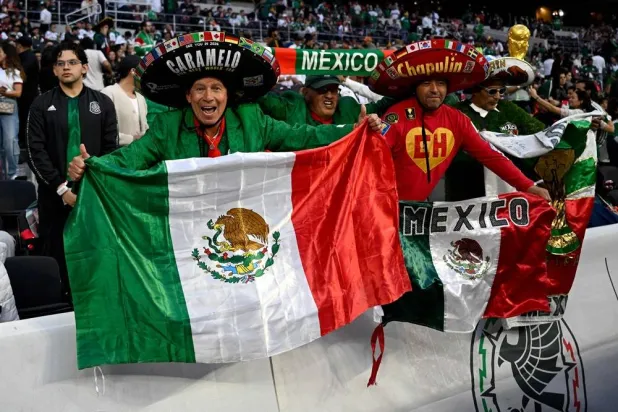 Mexican fans cheer for their team during a friendly football match between Mexico and Portugal at the Banorte (formerly known as Azteca) Stadium in Mexico City on March 28, 2026. (AFP) 