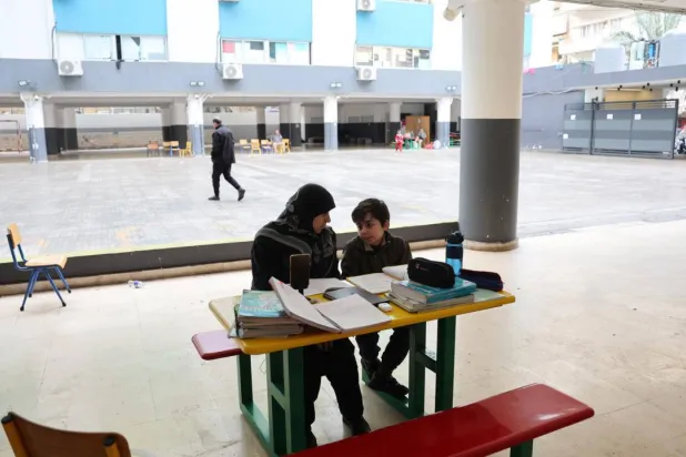 UNICEF says the war has left almost half a million students out of school in Lebanon. Anwar AMRO / AFP